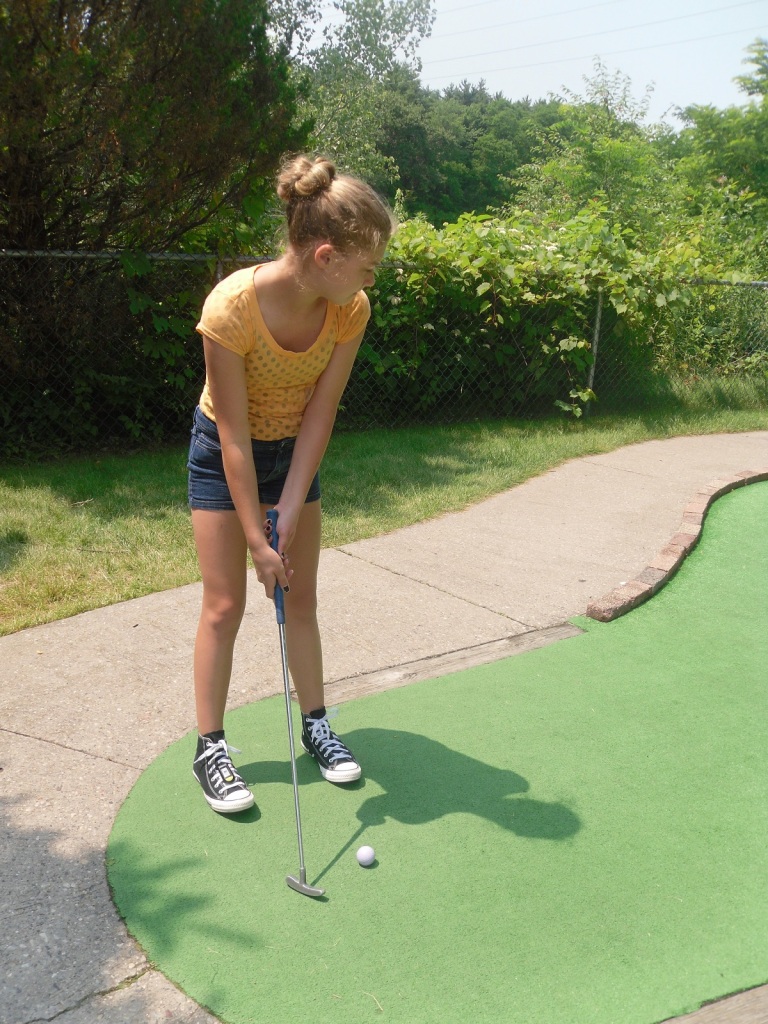 Lydia golfing